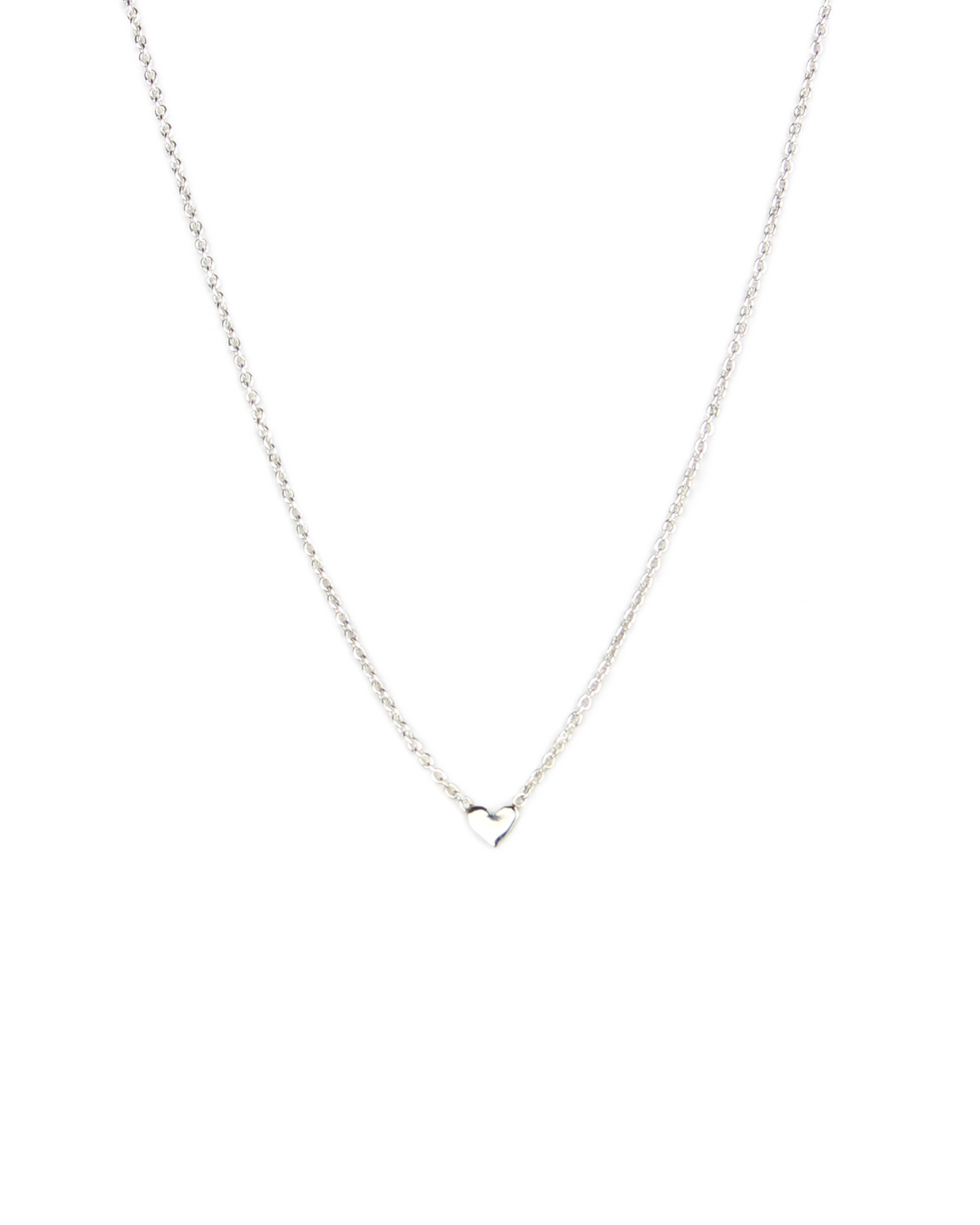 Silver necklace with a heart pendant on a white background