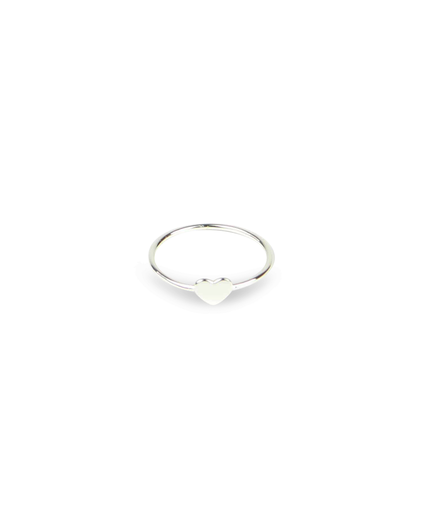 Silver heart ring on a white background