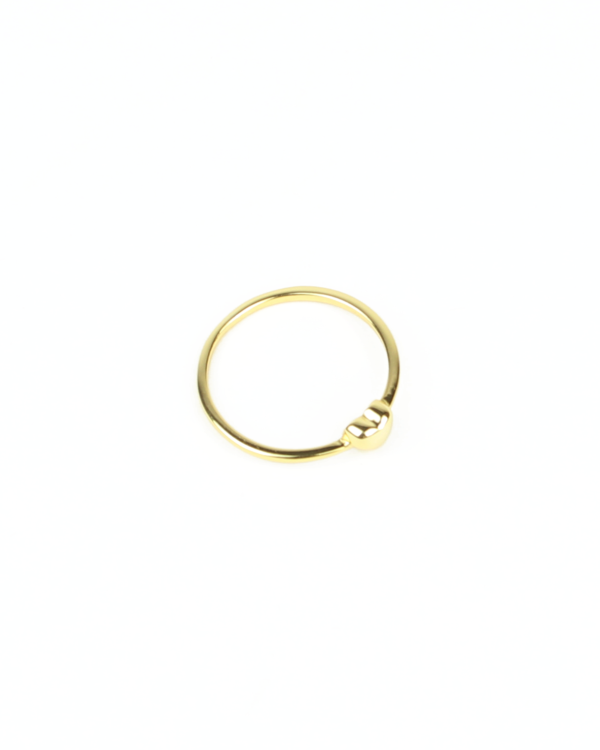 Gold ring on a white background