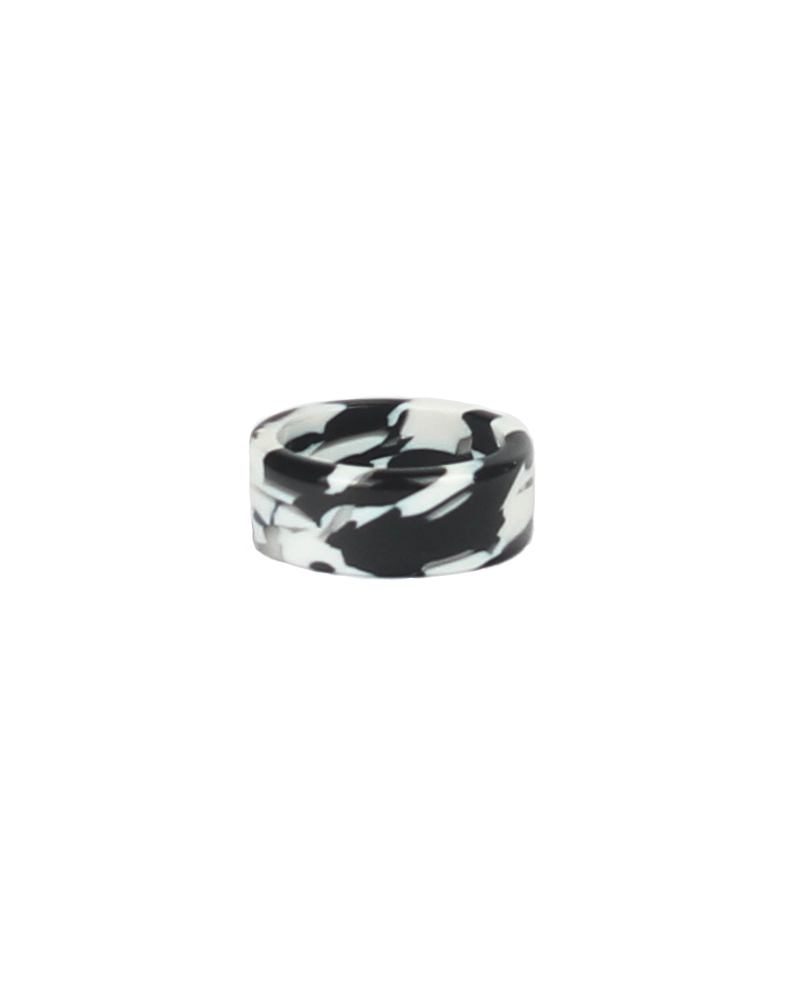 Black and white marbled ring on a white background