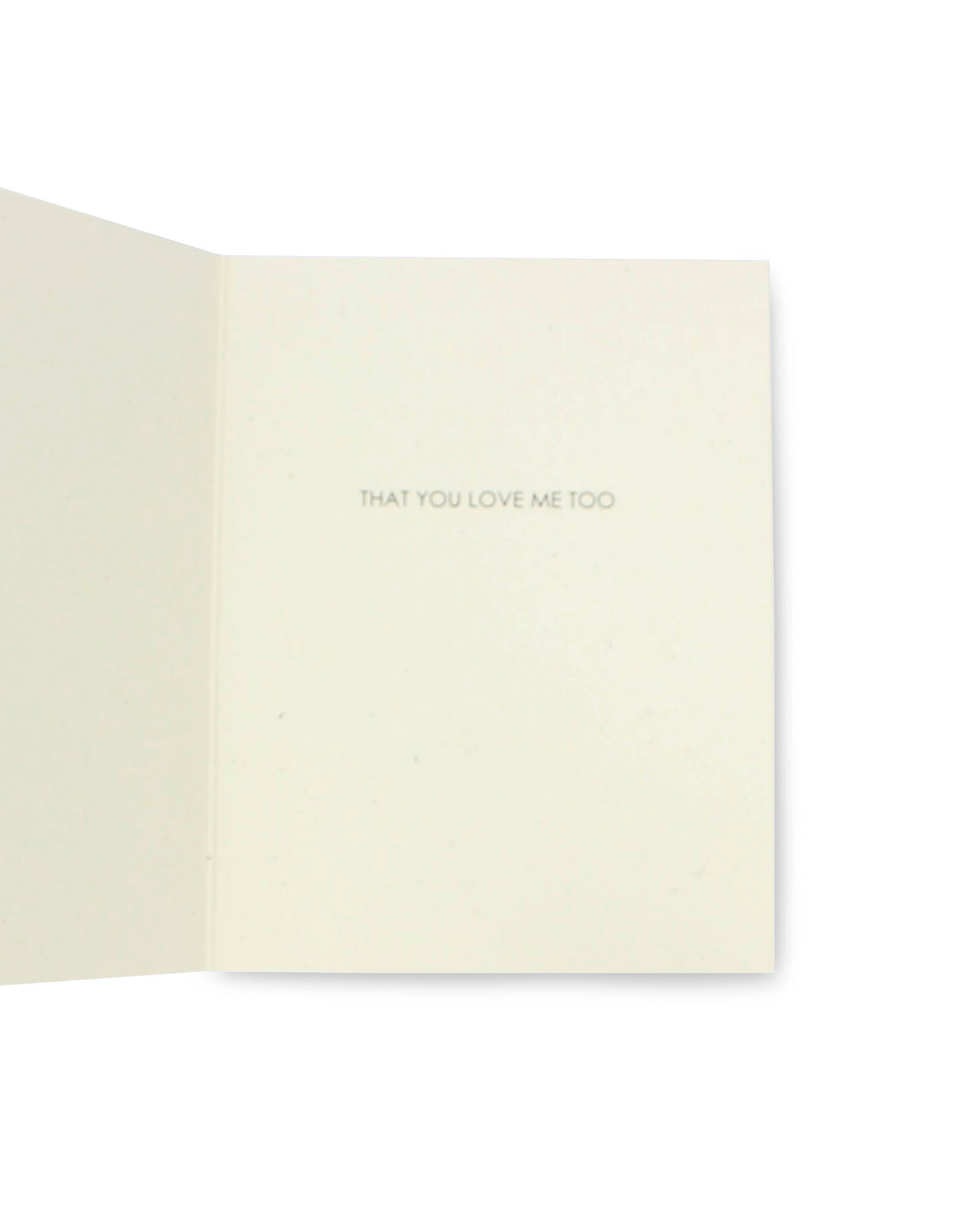 Beige greeting card with 'THAT YOU LOVE ME TOO' text on a white background