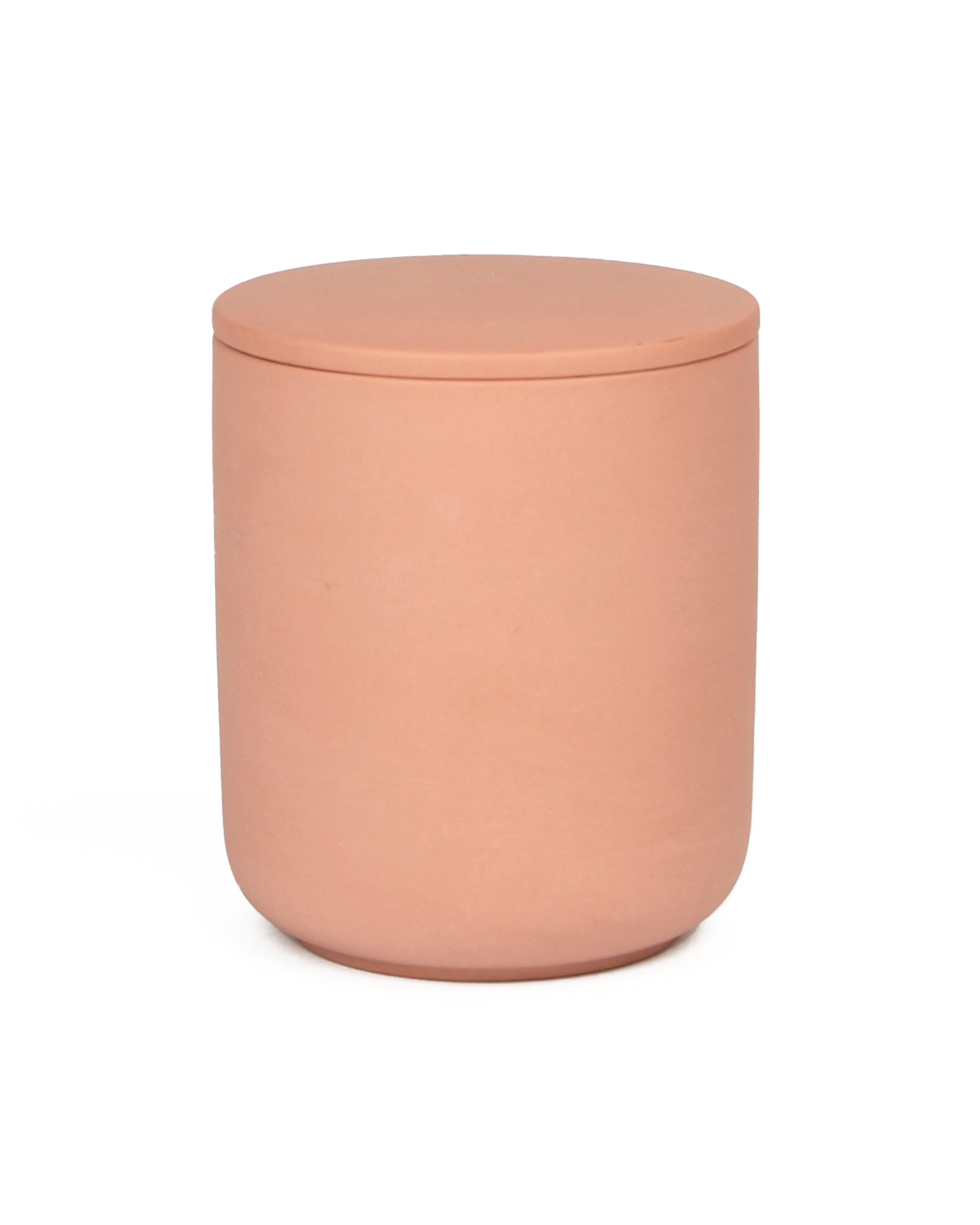 Pink cylindrical container with a lid on a white background