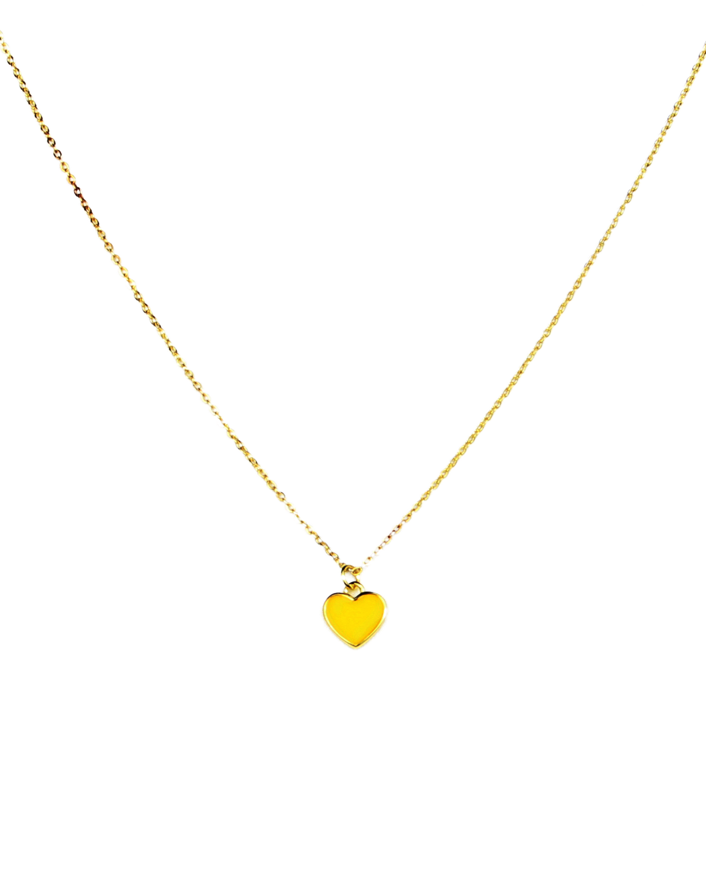 Gold necklace with a heart-shaped pendant on a white background
