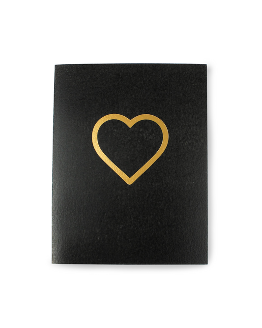 Black card with a gold heart design on a white background