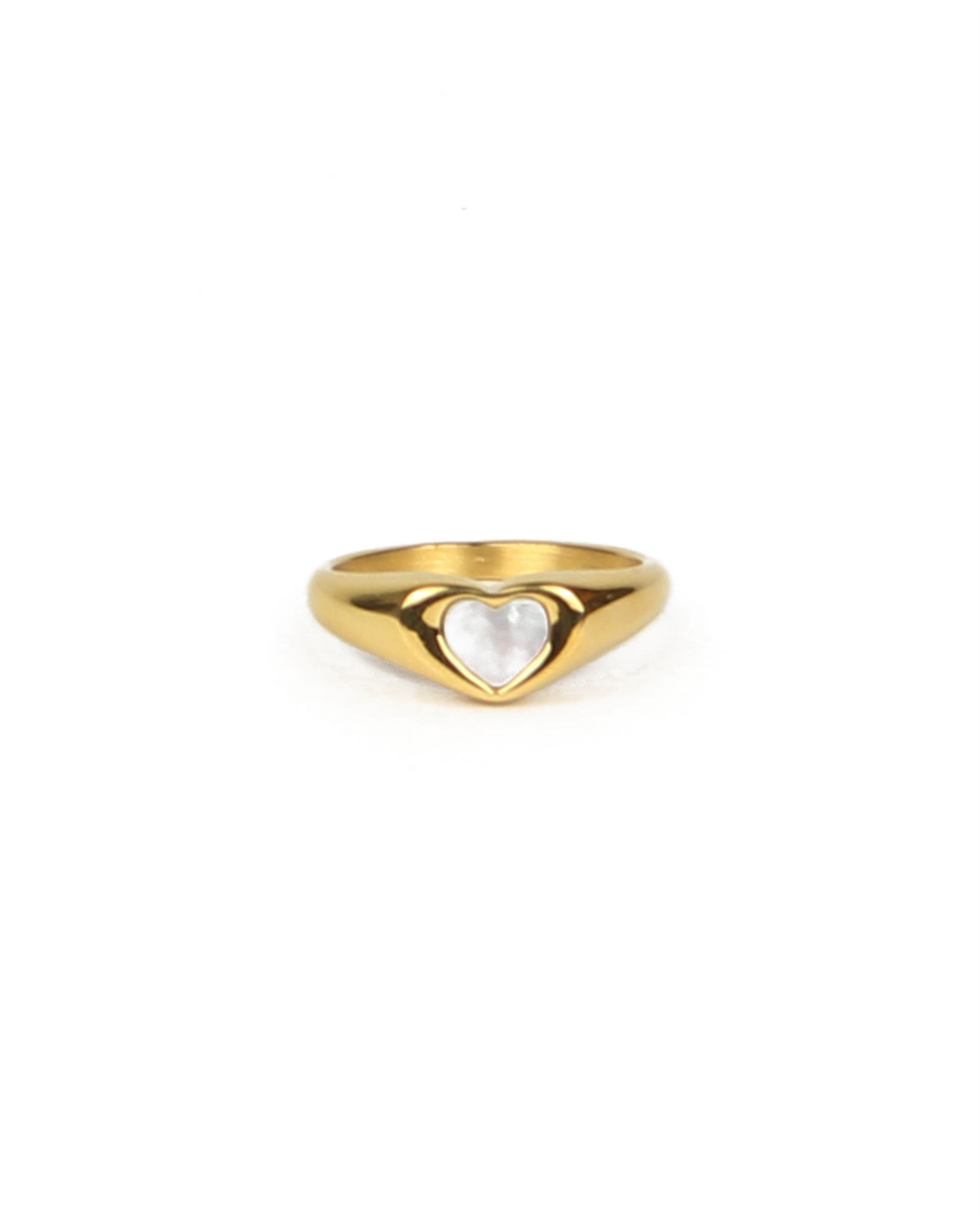 Gold ring with a heart-shaped pearl on a white background