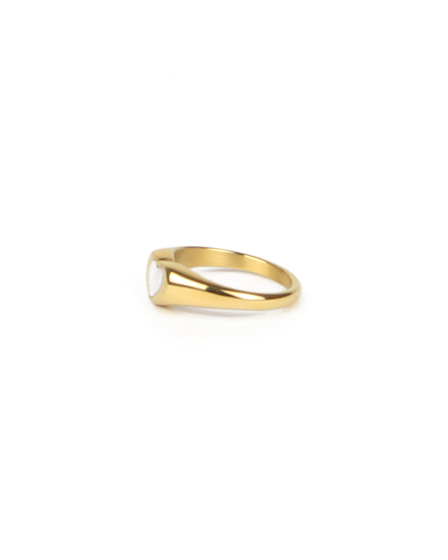Gold ring on a white background