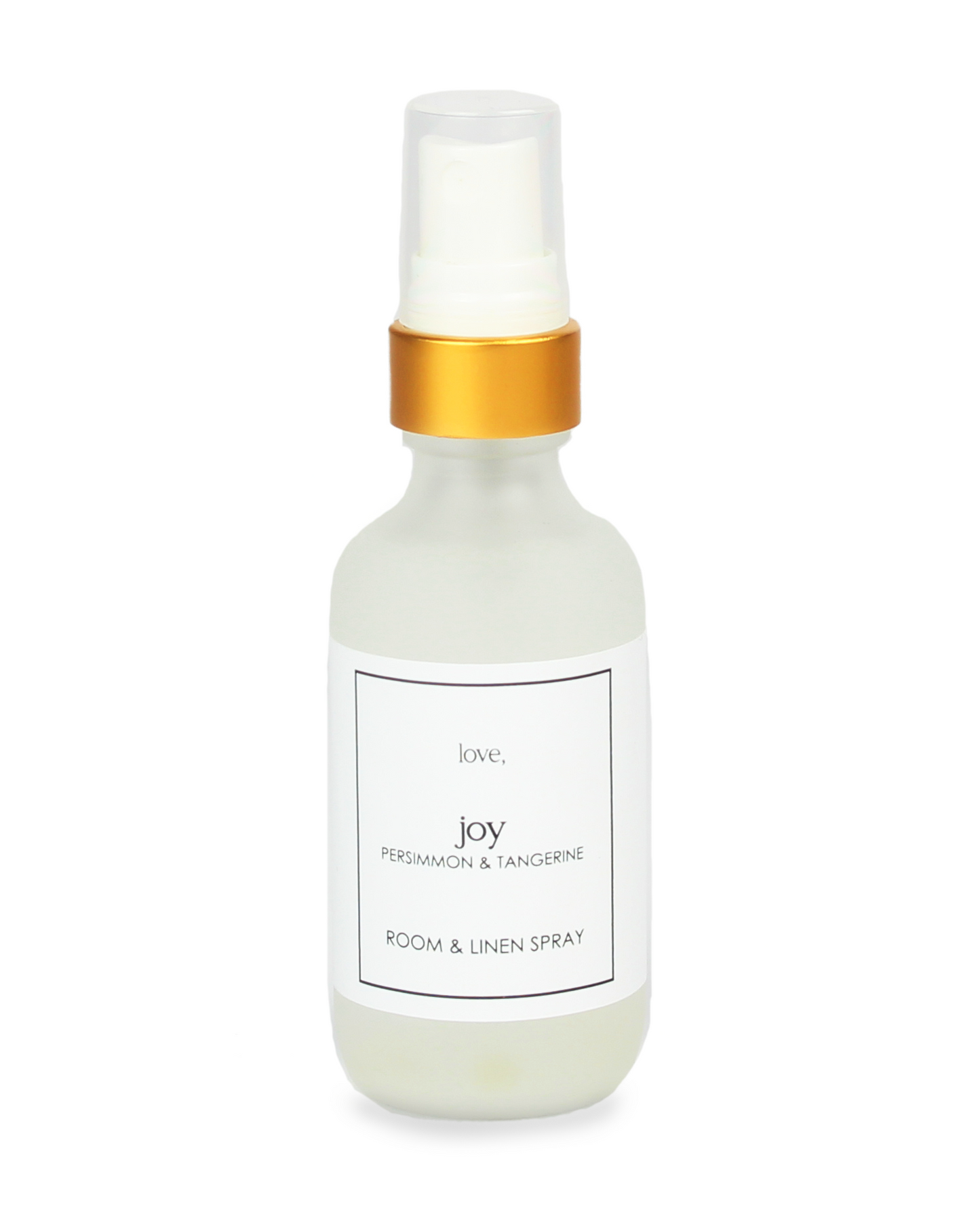 Room and linen spray bottle with gold cap on a white background