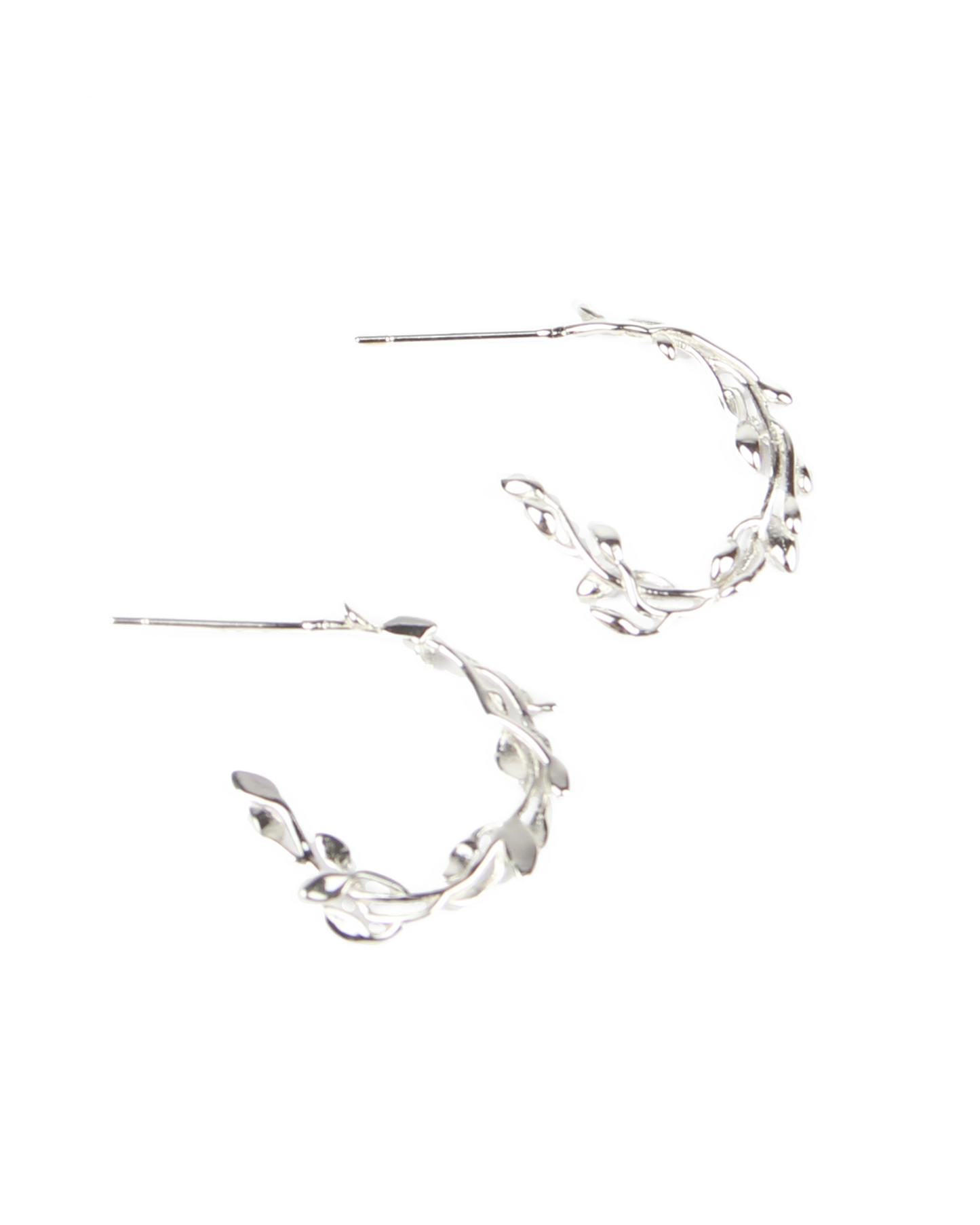 Silver hoop earrings on a white background