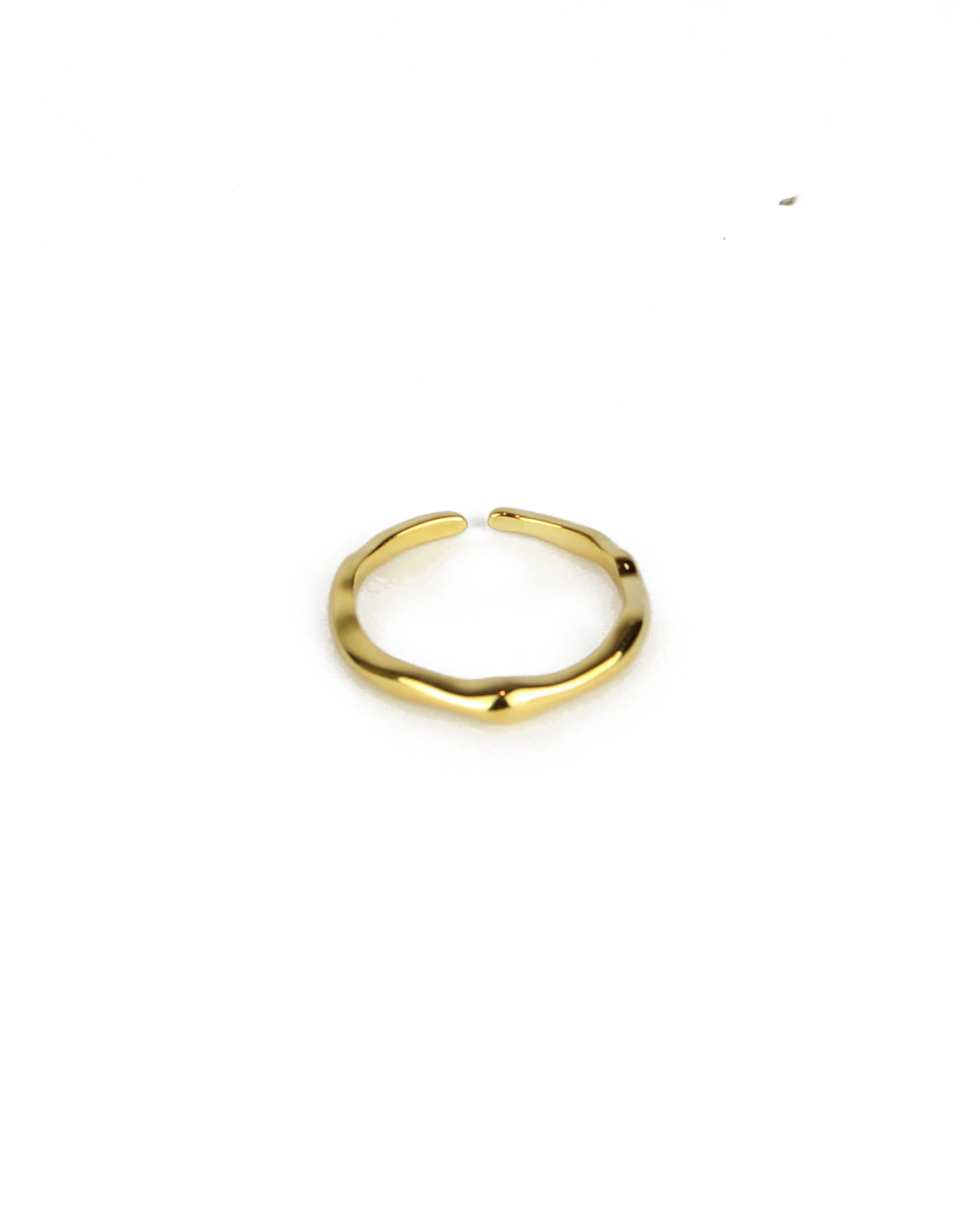 Gold ring on a white background