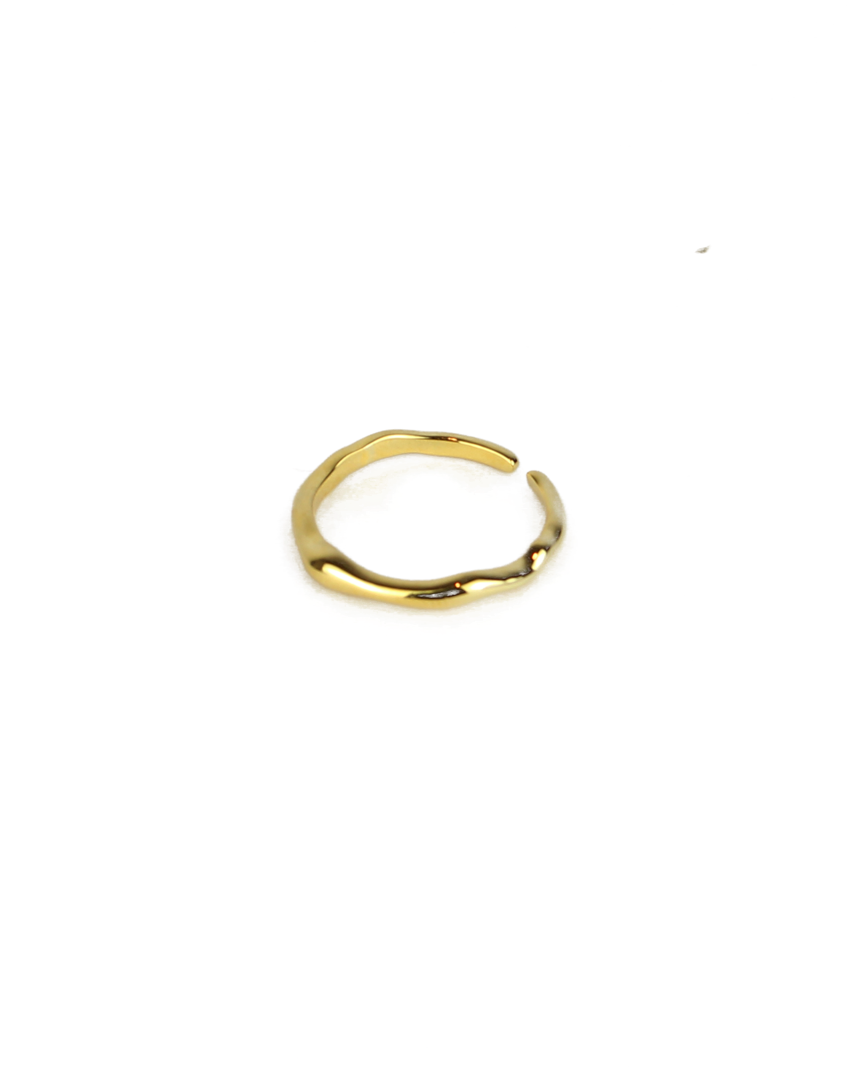 Gold ring on a white background