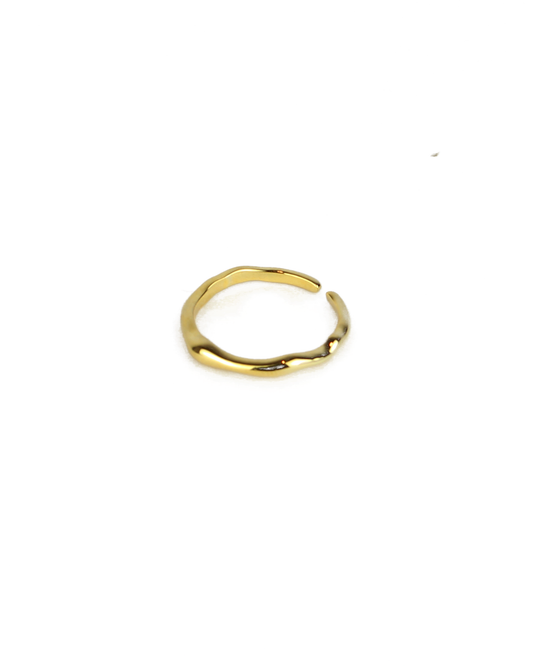 Gold ring on a white background