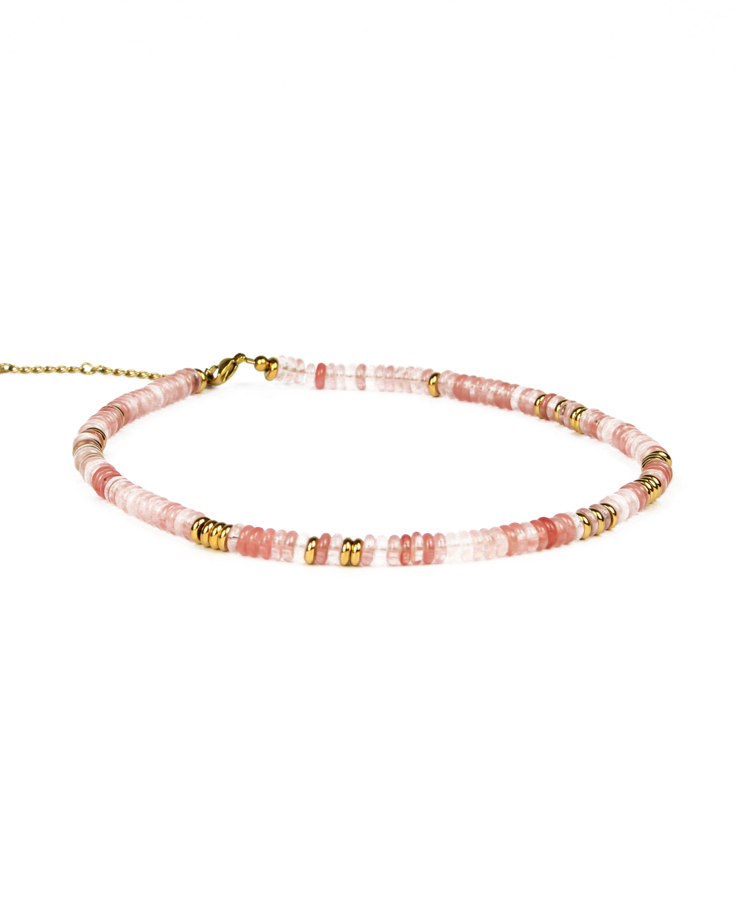 Beaded necklace with pink and gold accents on a white background
