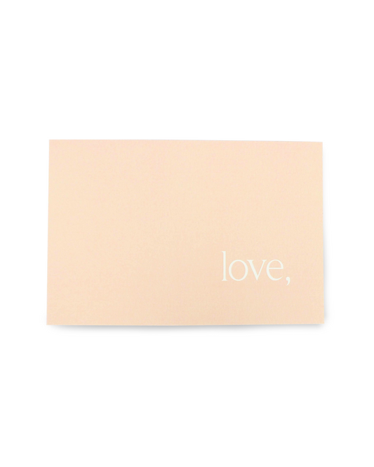 Beige card with 'love,' text on a white background