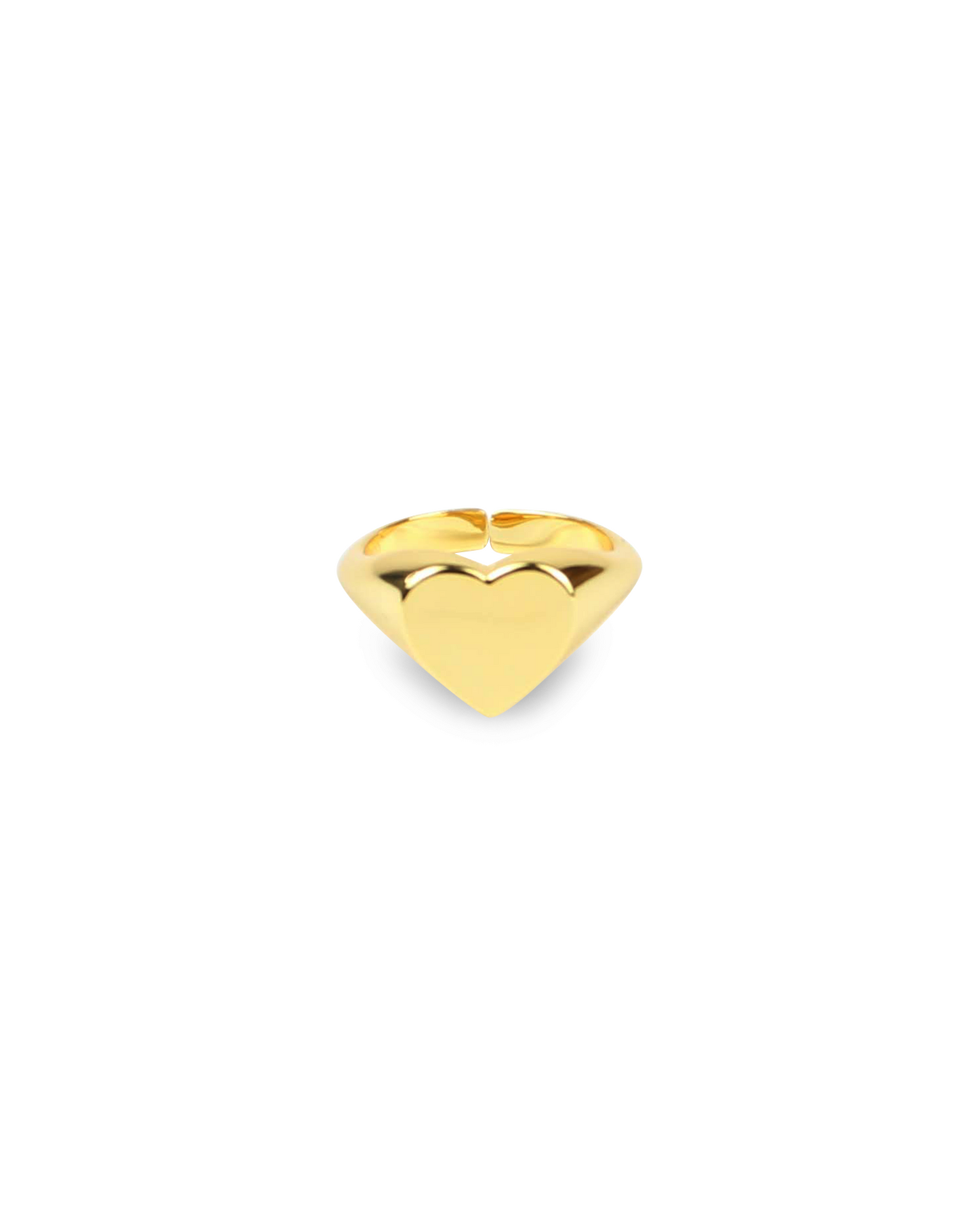 Gold heart-shaped ring on a white background