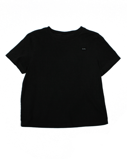 Black t-shirt with a small logo on a white background