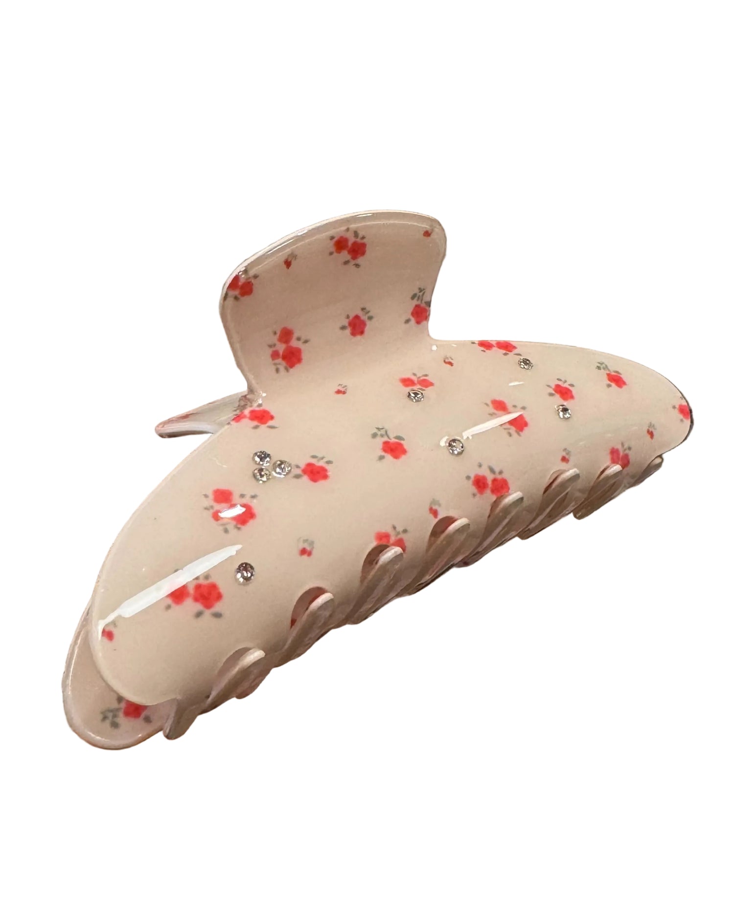Oversized floral claw clip with pink floral design and rhinestones.