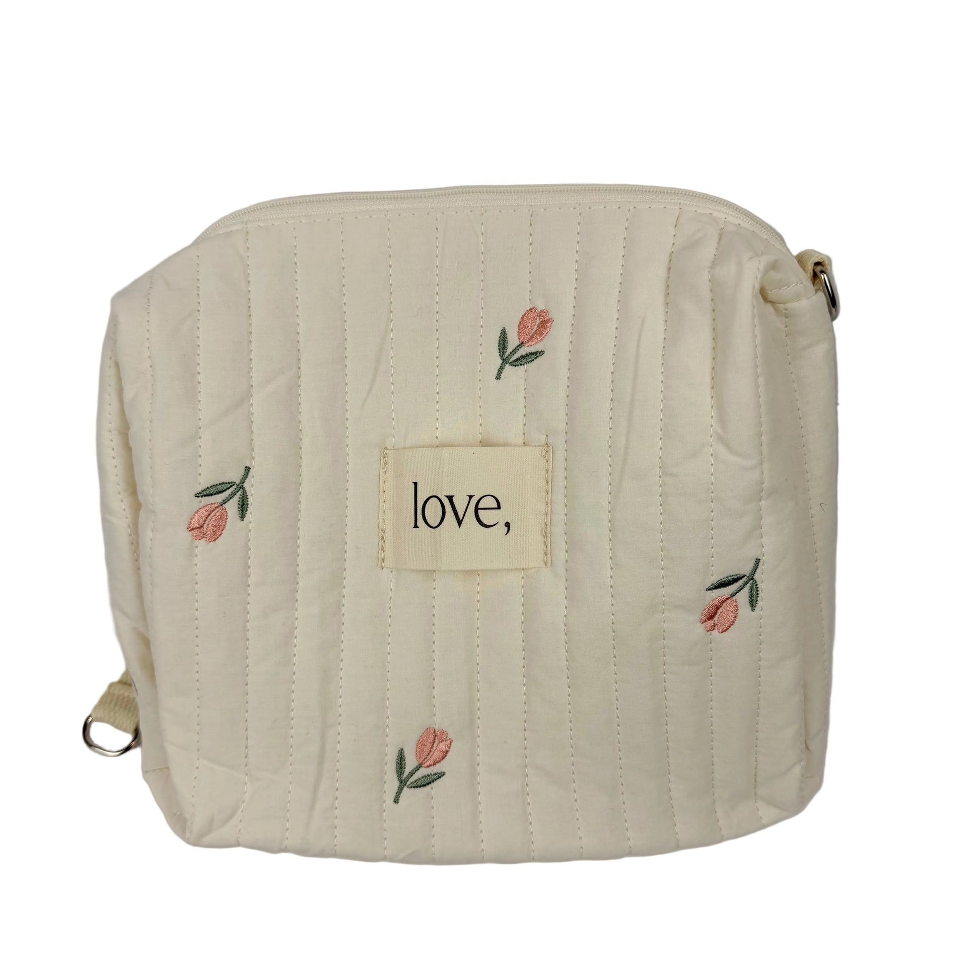 Beige pouch with floral designs and a 'love' patch on a light gray background