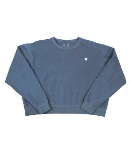 blue sweatshirt with blue heart patch on white background