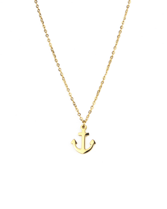 Gold anchor necklace on a white background