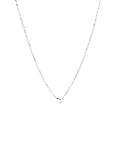 Silver necklace with a heart pendant on a white background