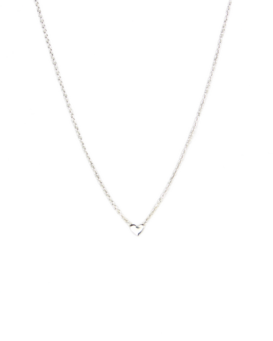 Silver necklace with a heart pendant on a white background