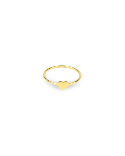 Gold ring with a heart shape on a white background