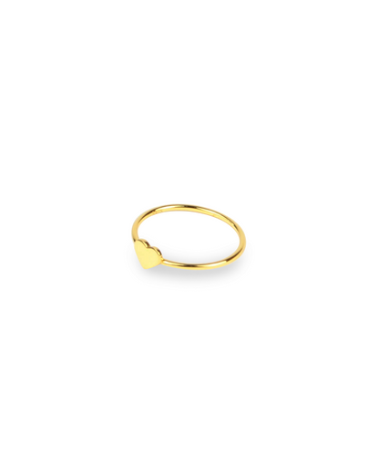 Gold ring with a heart-shaped design on a white background