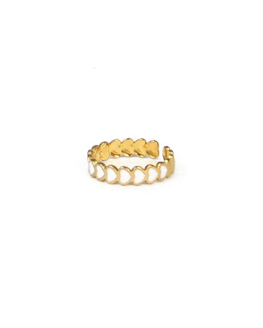 Gold ring with a unique design on a white background