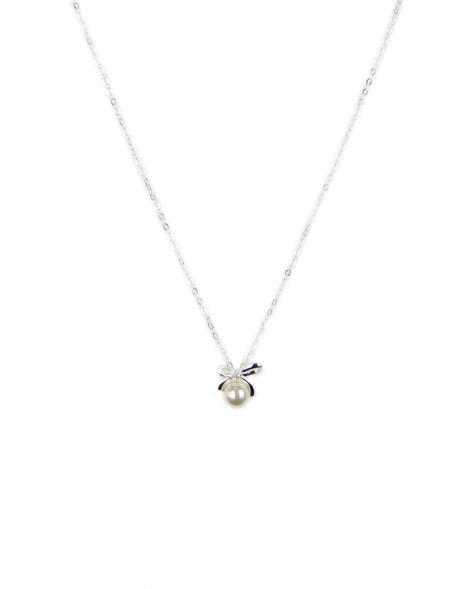 Silver necklace with a small pendant on a white background