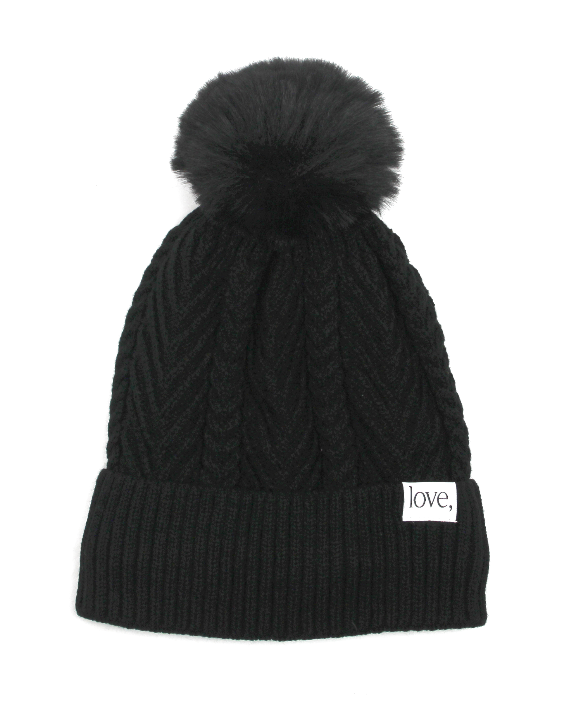 black pom beanie on a white background
