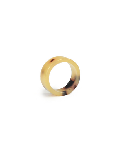 Tortoiseshell ring on a white background