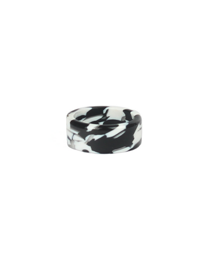 Black and white marbled ring on a white background