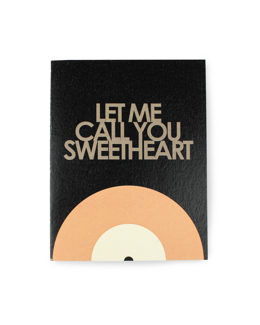 Black card with gold text 'Let me call you sweetheart' on a white background