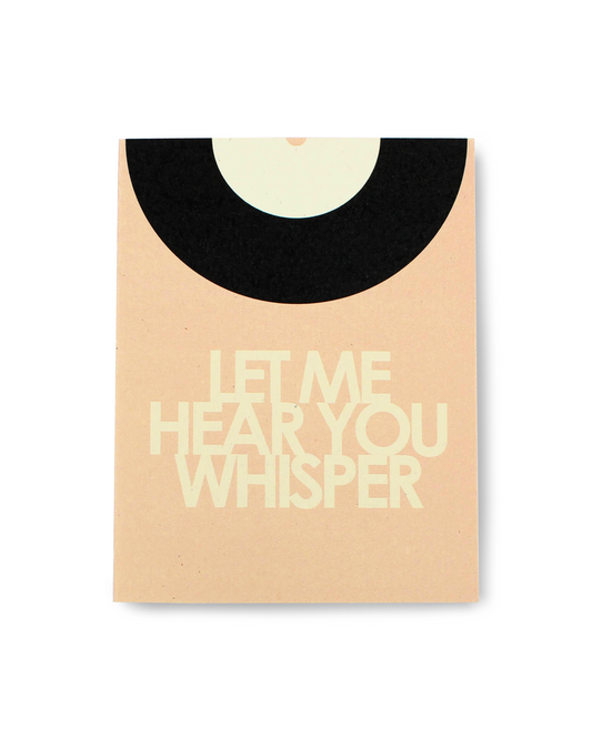Card with 'Let Me Hear You Whisper' text on a beige background