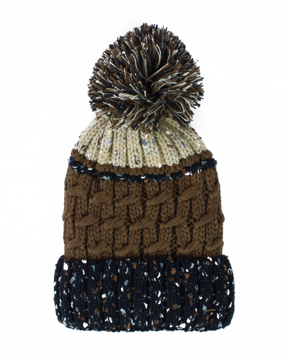 Multicolored knit beanie with pom-pom on a white background