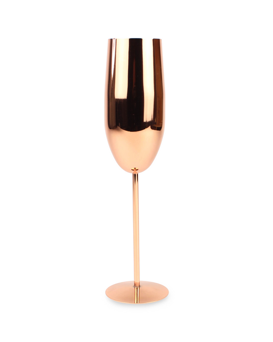 Rose gold champagne flute on a white background