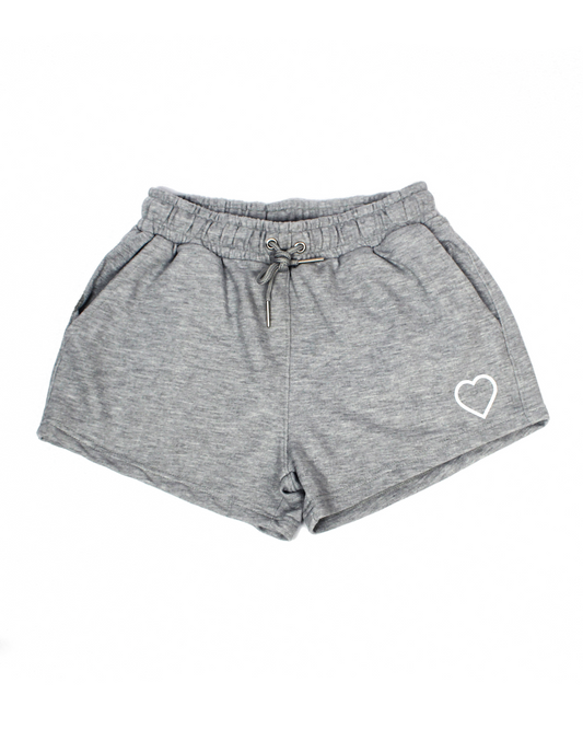 Gray shorts with a heart logo on a white background