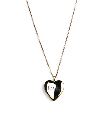 Heart-shaped pendant necklace with 'love,' engraving on a white background
