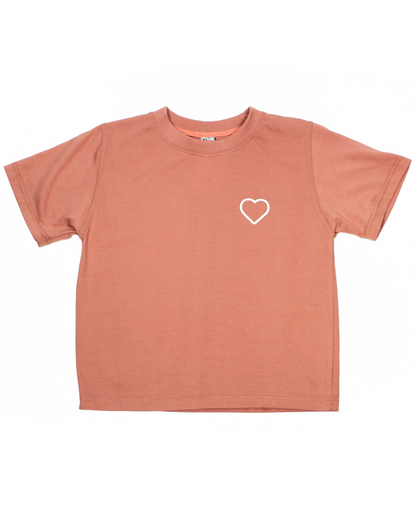 Coral t-shirt with a white heart on a white background