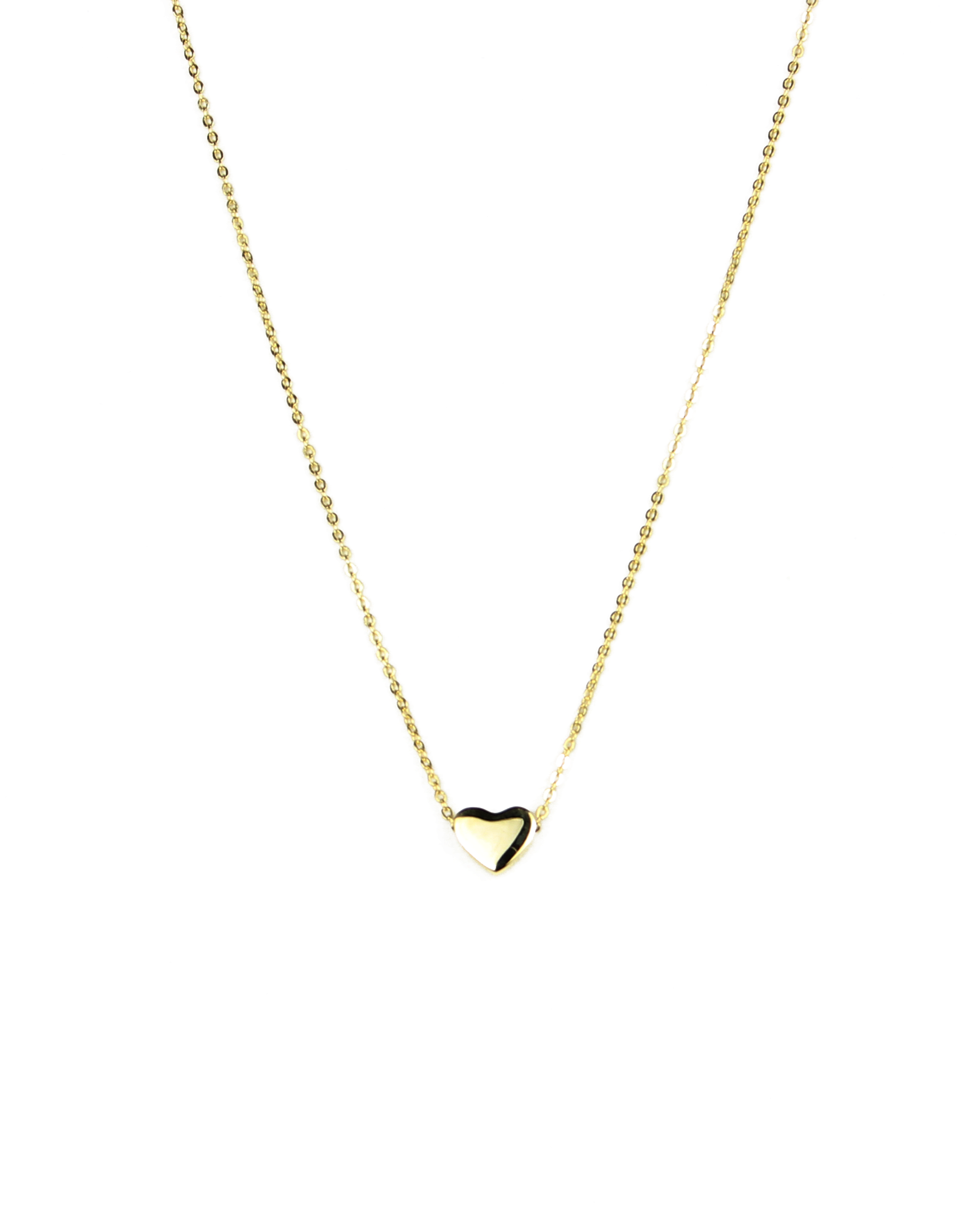 necklace with a heart bead on a gold chain on a white background