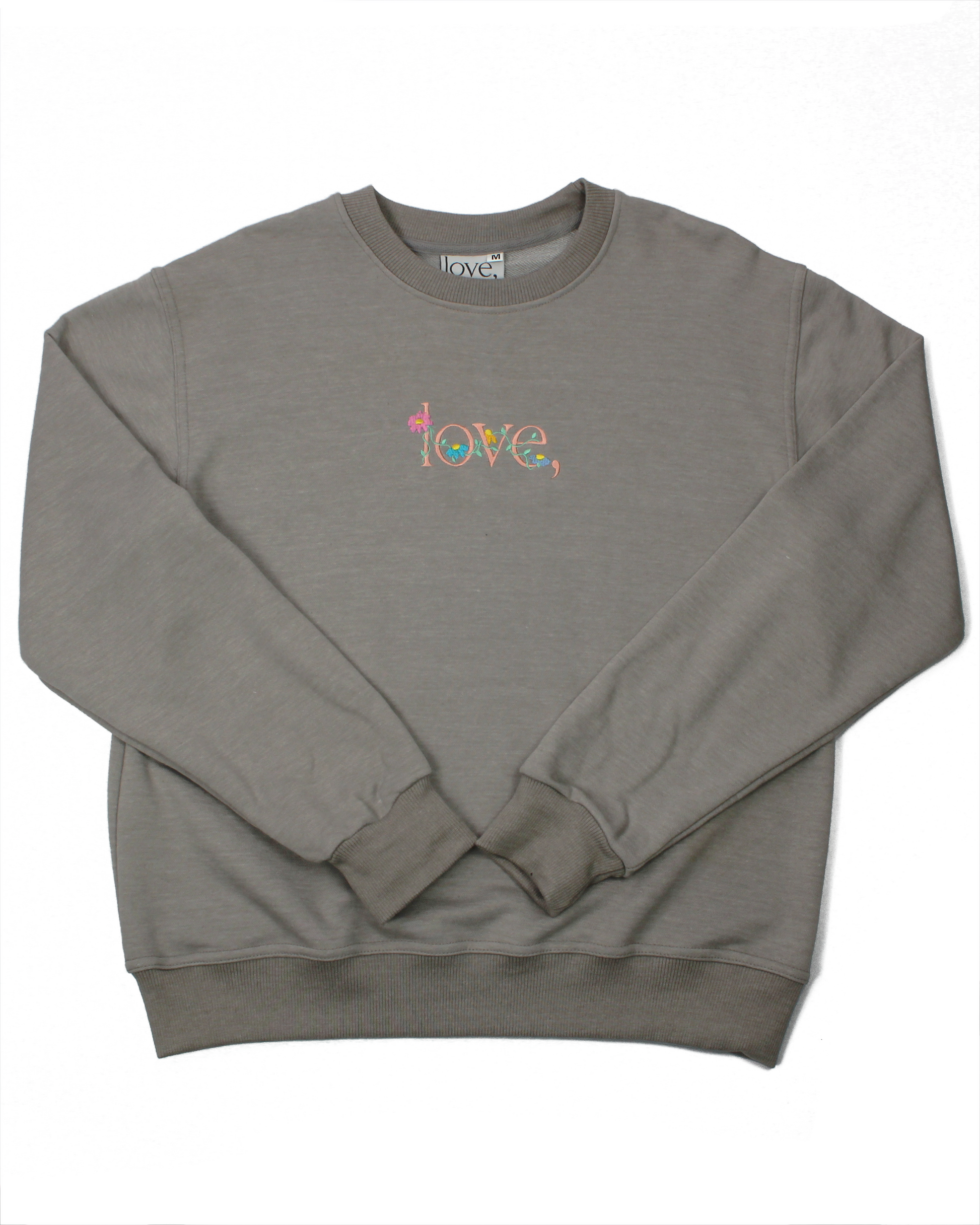 Gray sweatshirt with 'love' embroidered in colorful letters on a white background