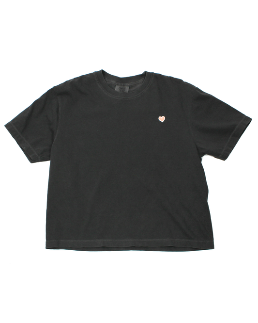 dark grey t-shirt with pink heart on left chest