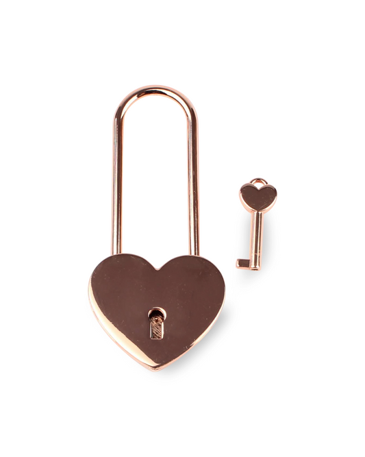 Heart-shaped padlock with a key on a white background