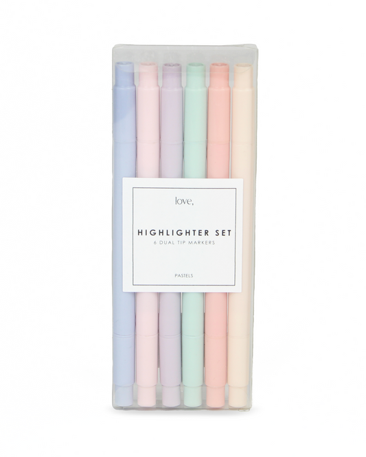 Set of pastel-colored highlighters in a clear plastic case with a white label on a white background.