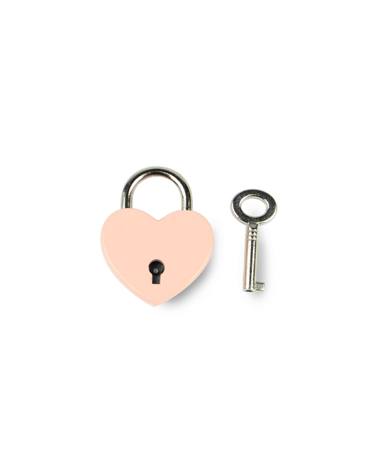 Heart-shaped padlock with a key on a white background