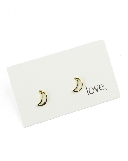moon earrings on a card on a white background