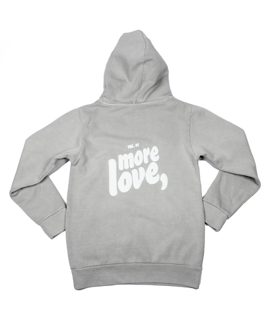 grey hoodie on a white background with text more love,