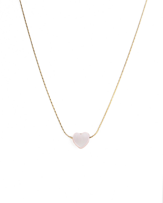 Necklace with a heart-shaped pink pendant on a white background
