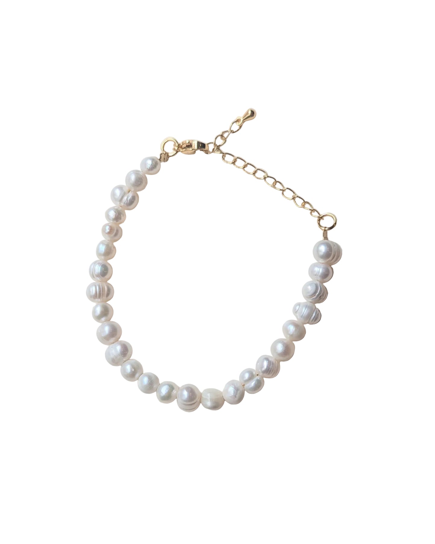 Pearl bracelet with gold clasp on a white background