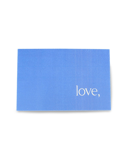 Blue card with 'love,' text on a white background